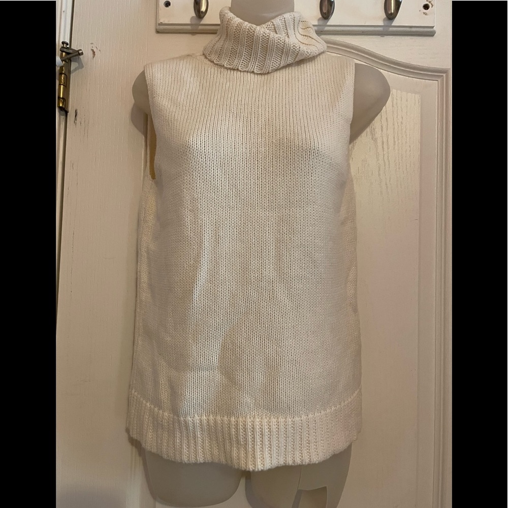 Cream colored turtle neck sleeveless sweater size small